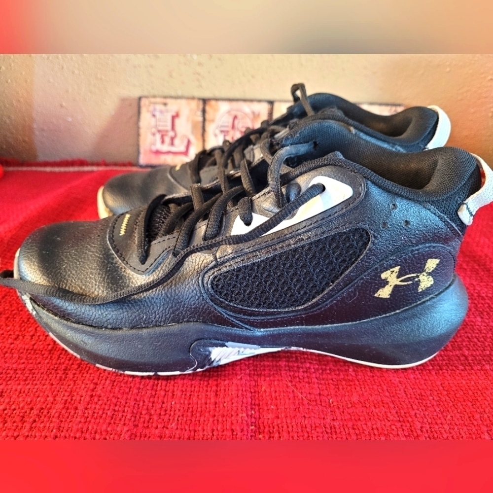 Under Armour Youth size 5 shoes.